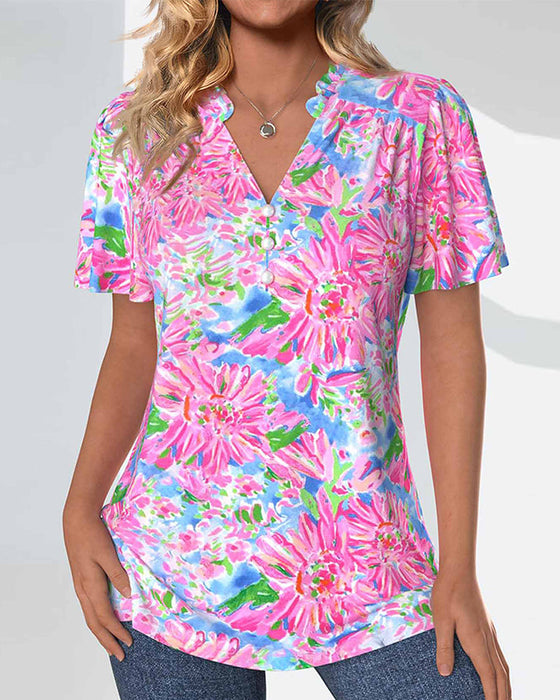 Bluzka z krótkim rękawkiem w kwiaty i guziki