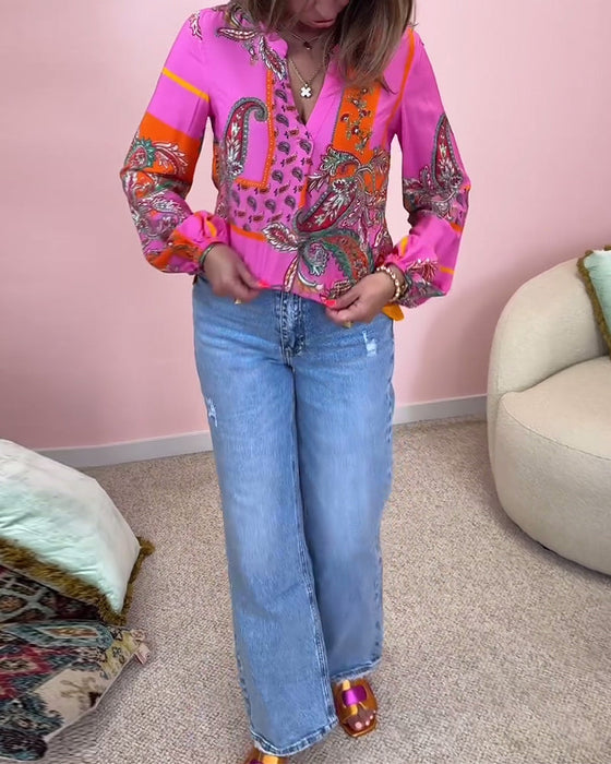 Modna bluzka z długim rękawem i dekoltem w kształcie litery V