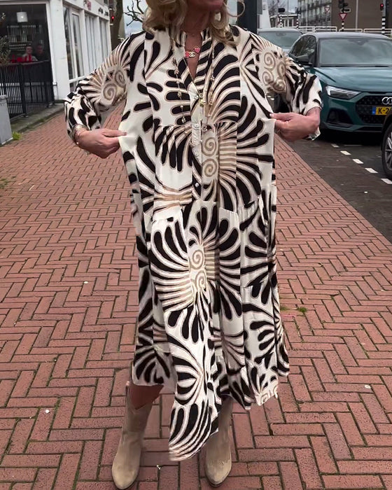 Sukienka z dekoltem w kształcie litery V i rozszerzanymi rękawami