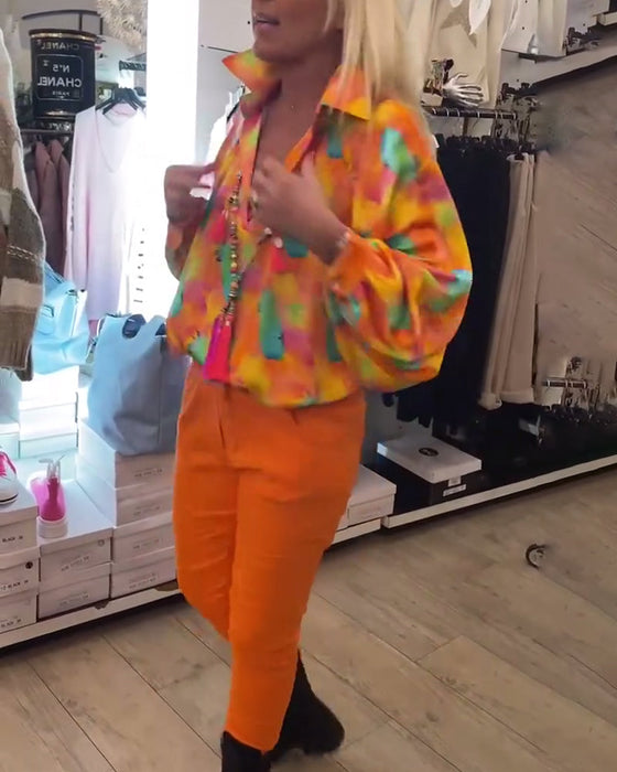 Damska bluzka z guzikami w kwiaty