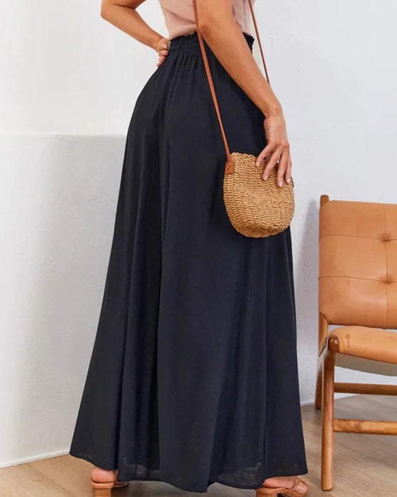 Jednokolorowe spodnie z szerokimi nogawkami i wysokim stanem