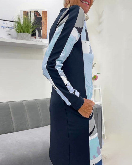 Sukienka z długim rękawem i kieszenią zapinana na suwak w bloki kolorów