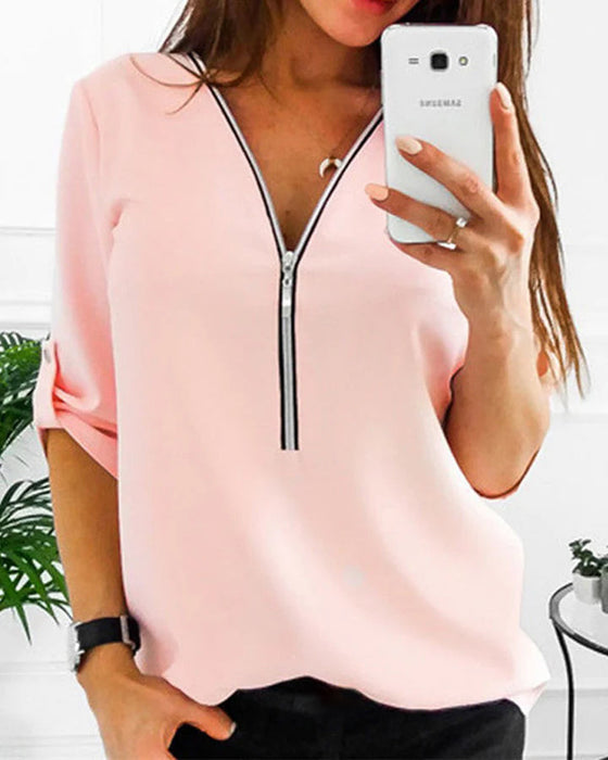 Solidna bluzka zapinana na zamek