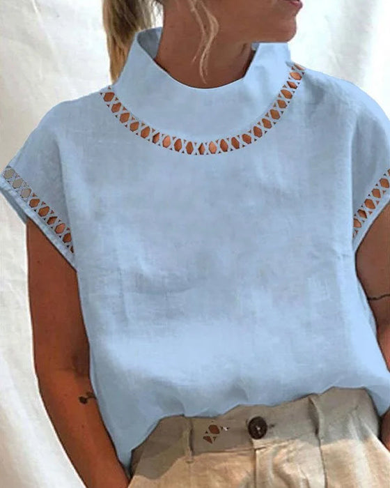 Bluzka ze stójką z koronki w jednolitym kolorze