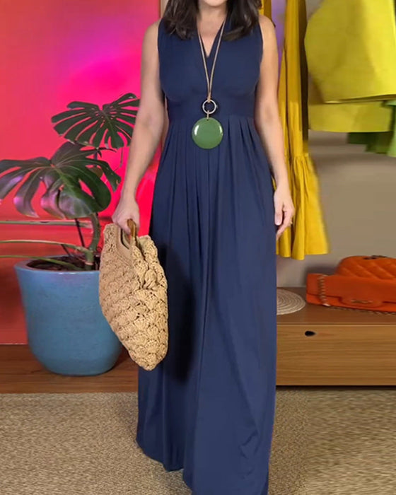 Elegancka, dopasowana, długa sukienka bez rękawów