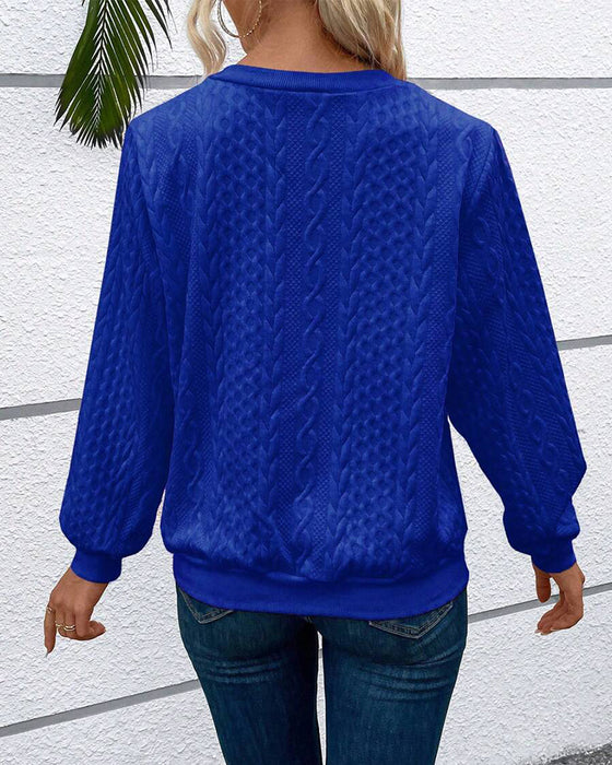 Luźna jednokolorowa bluza z długim rękawem i zamkiem błyskawicznym