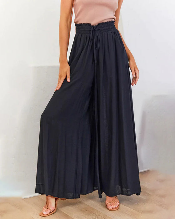 Jednokolorowe spodnie z szerokimi nogawkami i wysokim stanem