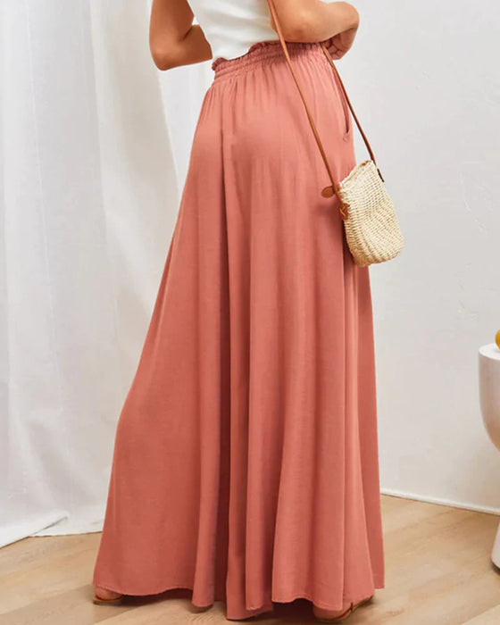 Jednokolorowe spodnie z szerokimi nogawkami i wysokim stanem