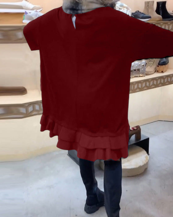 Sukienka o eleganckiej sylwetce i długim rękawie