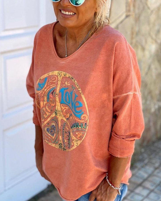 Pomarańczowy top z nadrukiem