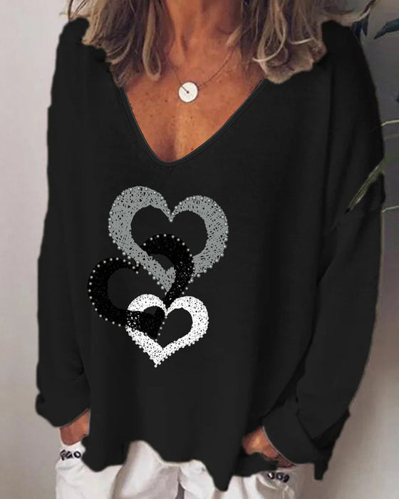 Bluzka z długim rękawem i nadrukiem serca