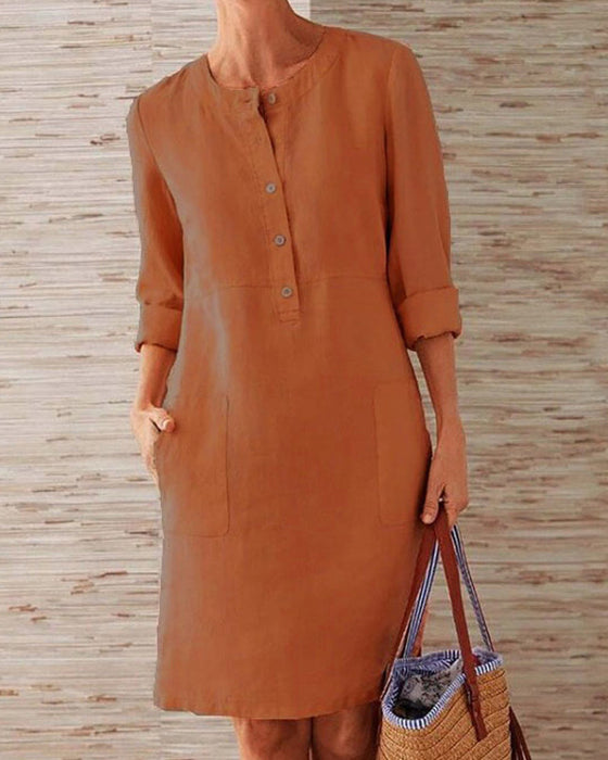 Jednolita sukienka do kolan z okrągłym dekoltem