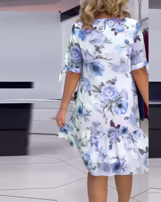 Elegancka sukienka w kwiaty z okrągłym dekoltem