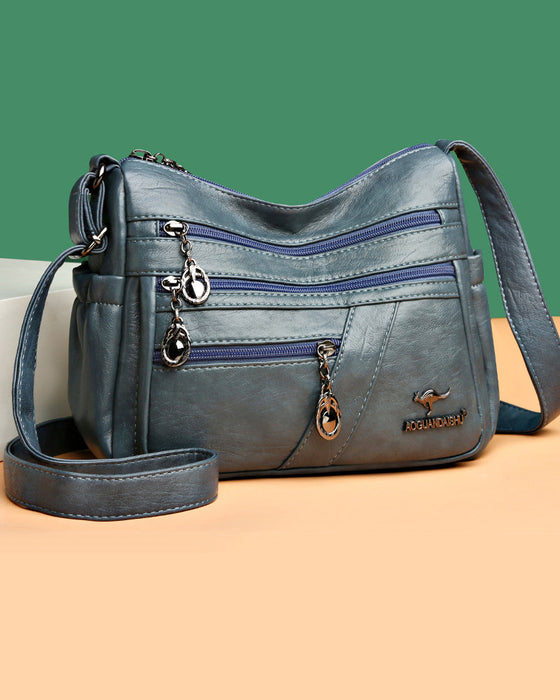 Wielokieszeniowa miękka skórzana torebka na ramię (crossbody)