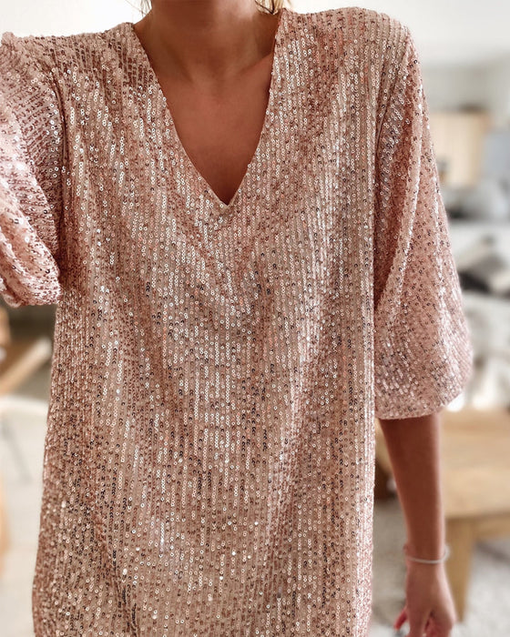 Cekinowa sukienka z dekoltem V