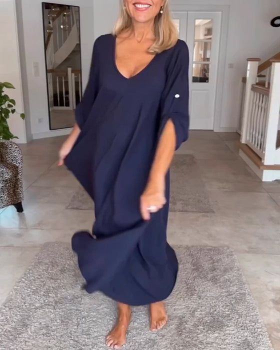 Sukienka w jednolitym kolorze z dekoltem w szpic