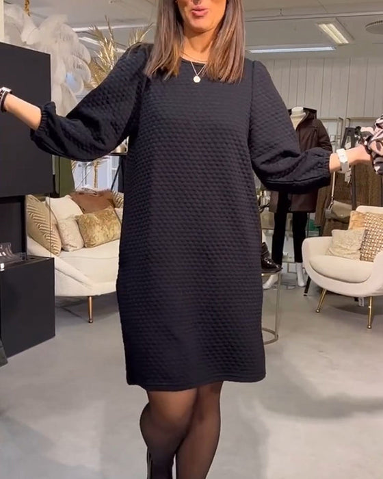 Elegancka sukienka w jednolitym kolorze