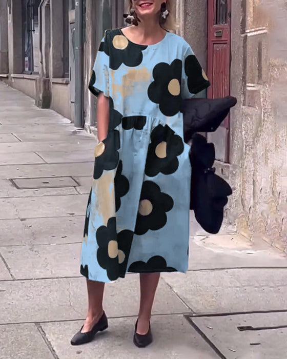 Luźna sukienka z kieszeniami i kwiatowym nadrukiem