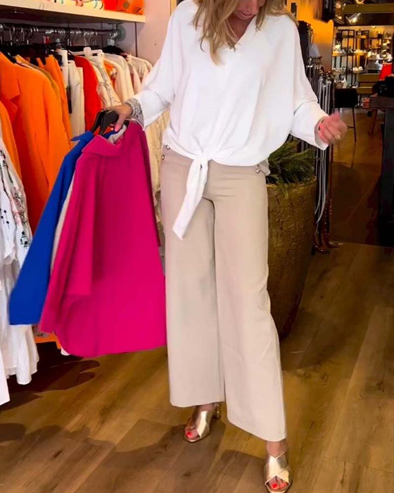 Wiązana bluzka z dekoltem w szpic