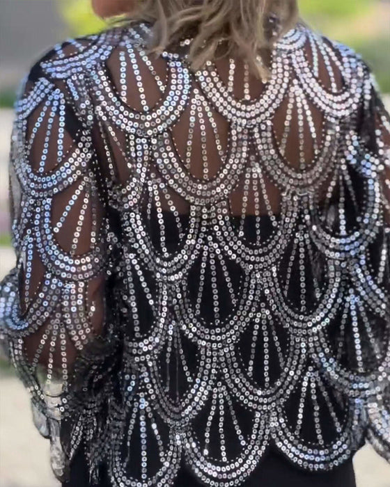 Elegancka marynarka z cekinami i falowanymi brzegami