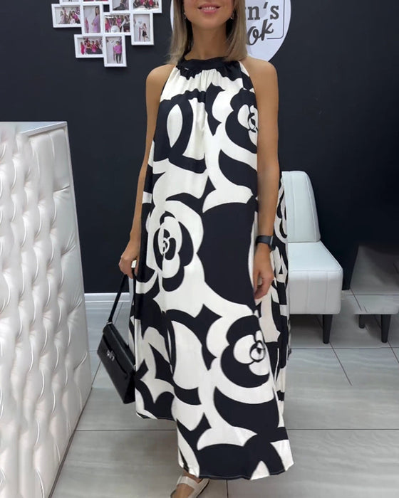 Elegancka sukienka bez rękawów z nadrukiem