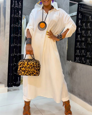 Sukienka z kieszeniami w jednolitym kolorze