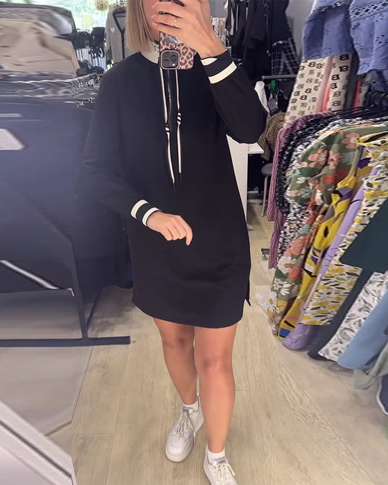 Sukienka z długim rękawem i stójką ściągana sznurkiem