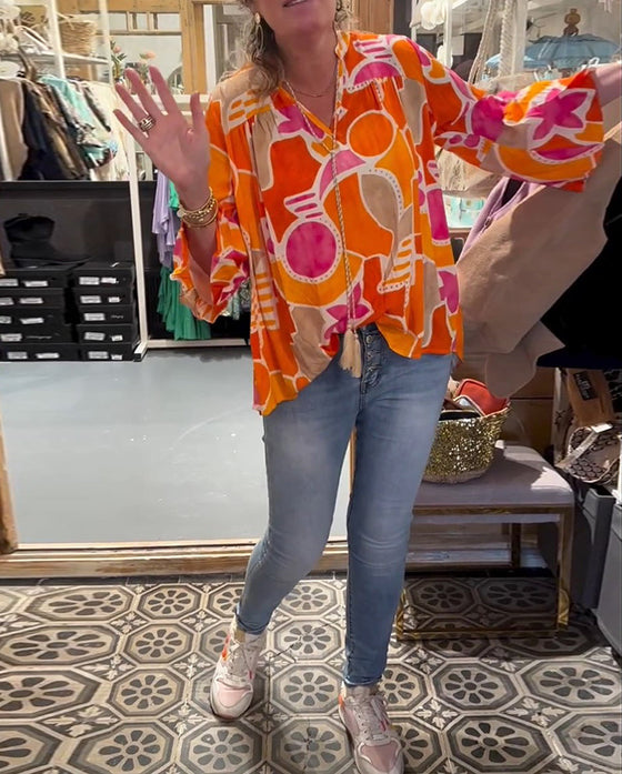 Bluzka kolorowa z szerokim ramieniem