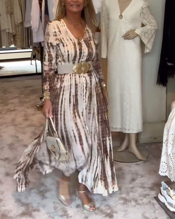 Sukienka z rozcięciem w talii długim rękawem i dekoltem w kształcie litery V