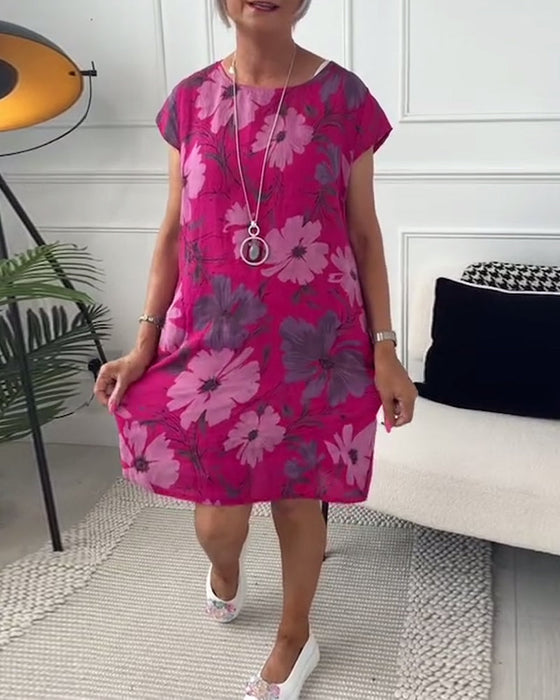 Luźna sukienka z krótkim rękawem i kwiatowym nadrukiem