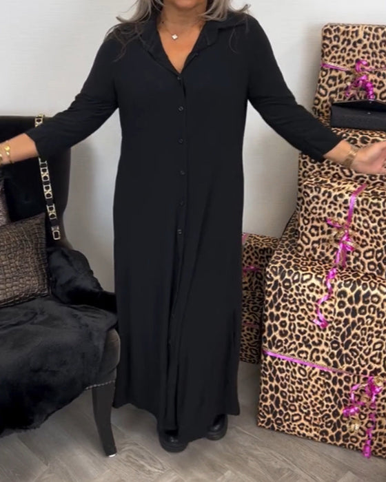 Sukienka zapinana na guziki z dekoltem w kształcie litery V