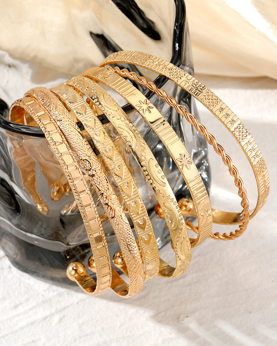 Zestaw bransoletek z sześcioramiennymi gwiazdkami, składający się z 7 sztuk