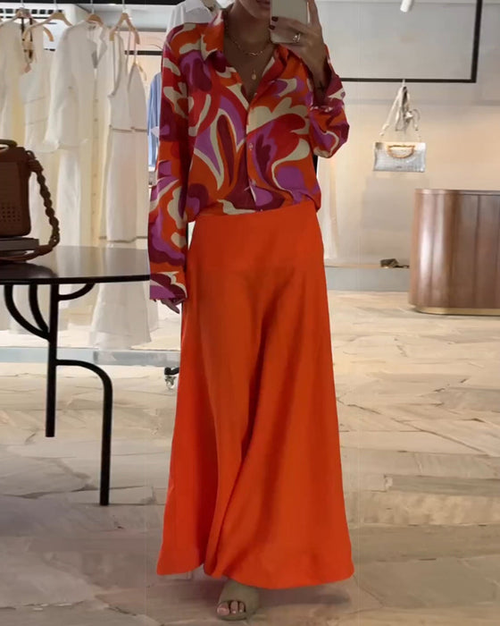 Kolorowa bluzka z klapą i guzikami