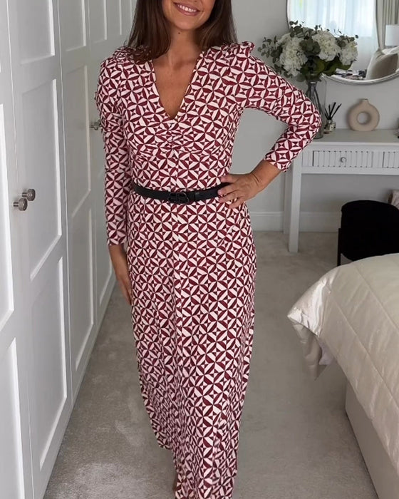 Elegancka sukienka z geometrycznym nadrukiem i dekoltem w kształcie litery V