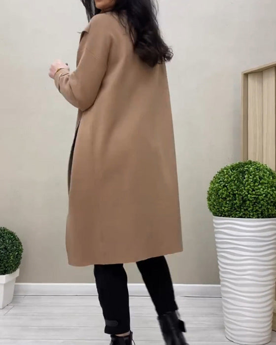 Sukienka sweterkowa z rozcięciami po bokach i golfem