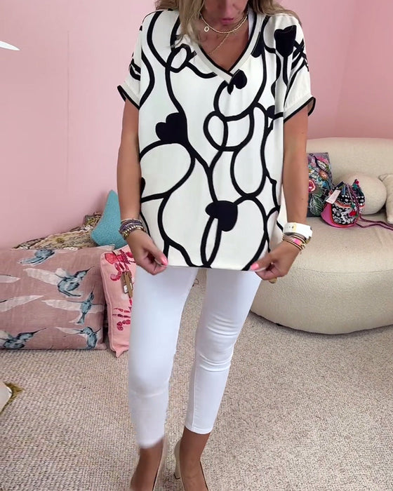 Bluzka z krótkim rękawem i dekoltem w kształcie litery V w kontrastowym kolorze