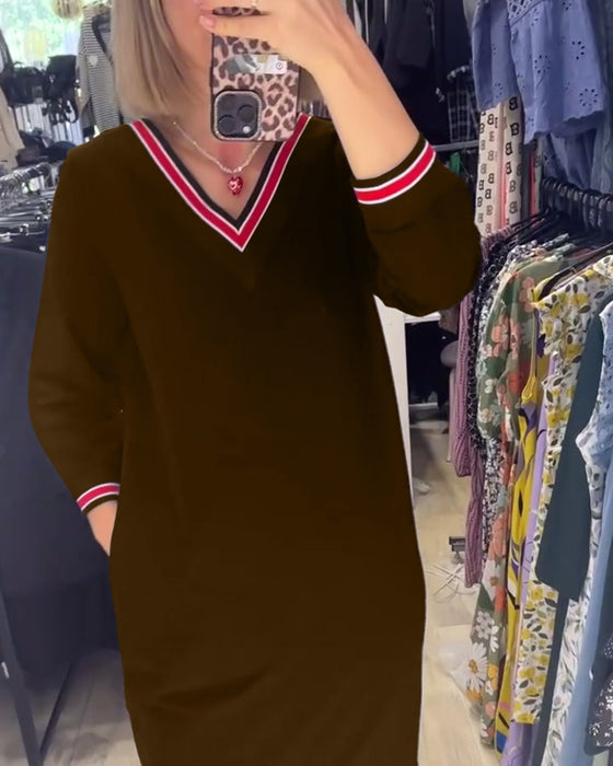 Sukienka z dekoltem w kształcie litery V i z kieszeniami