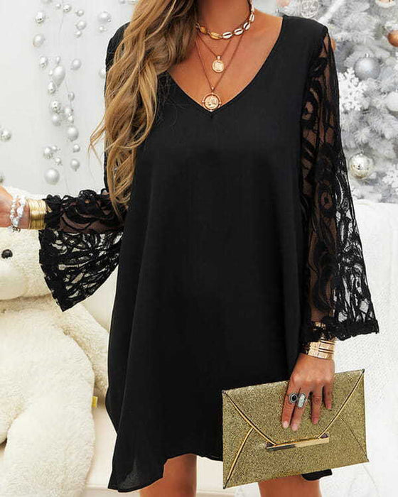 Elegancka czarna sukienka z koronkowymi rękawami