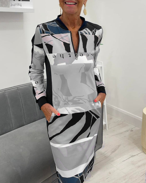 Sukienka z długim rękawem i kieszenią zapinana na suwak w bloki kolorów