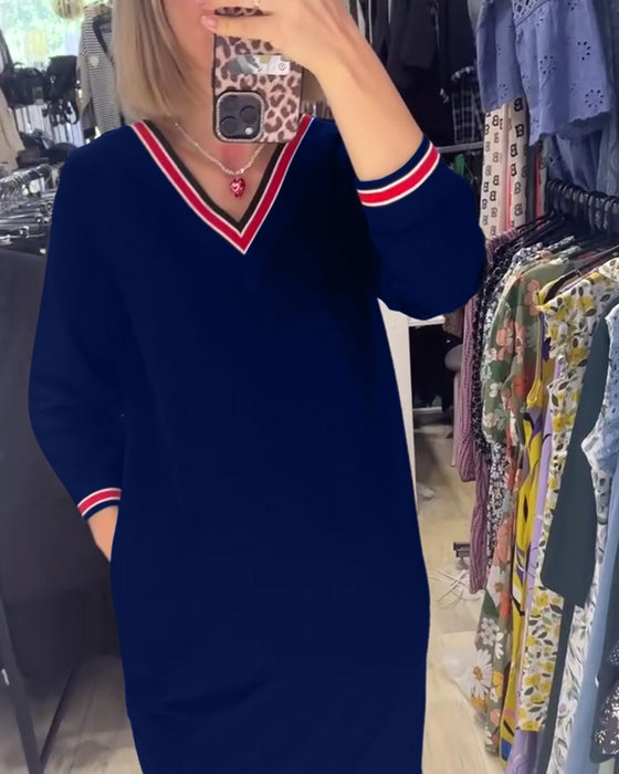 Sukienka z dekoltem w kształcie litery V i z kieszeniami