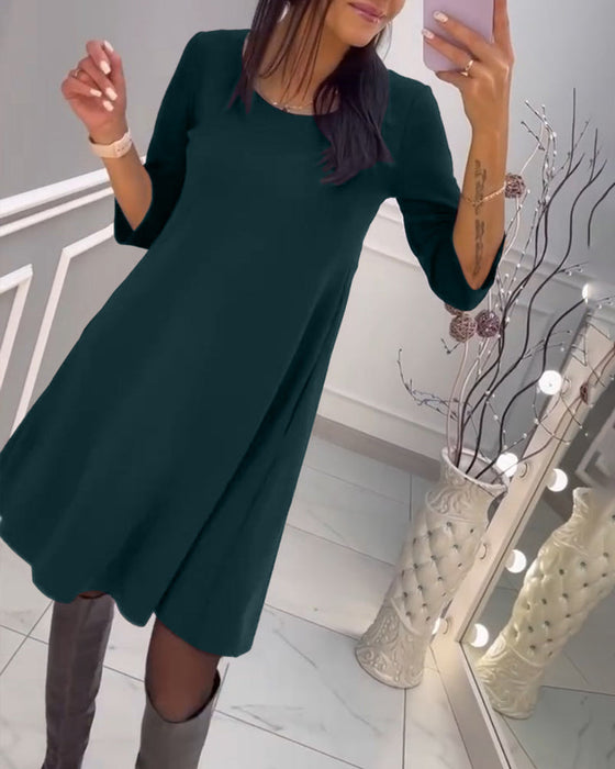 Sukienka w jednolitym kolorze z kokardą z tyłu