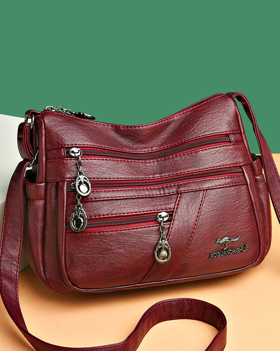 Wielokieszeniowa miękka skórzana torebka na ramię (crossbody)