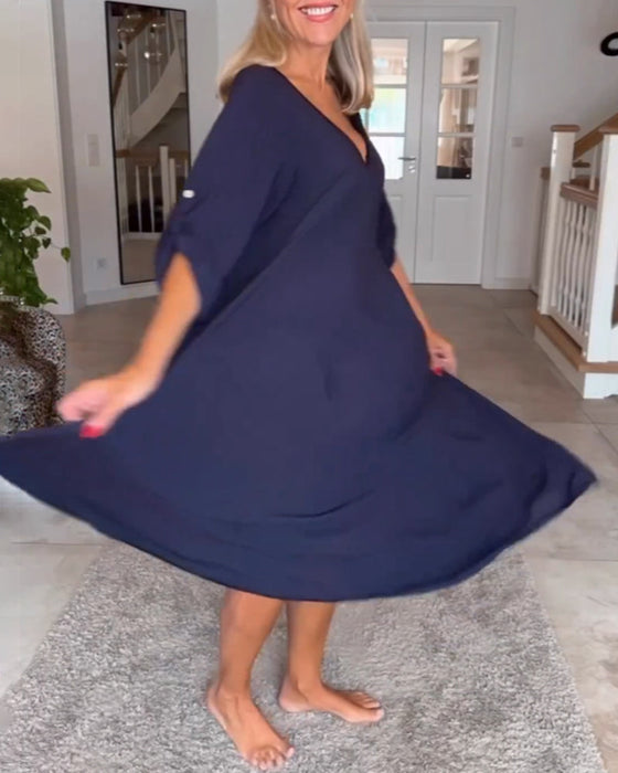 Sukienka w jednolitym kolorze z dekoltem w szpic