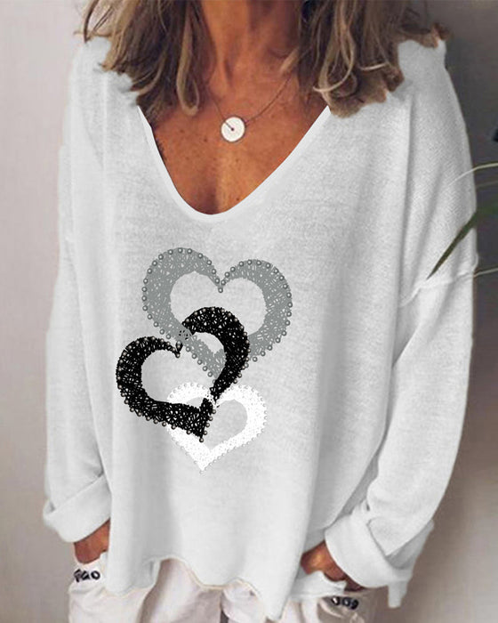 Bluzka z długim rękawem i nadrukiem serca