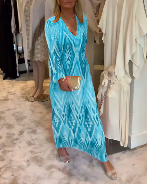 Sukienka z długim rękawem i głębokim dekoltem w kształcie litery V w stylu retro