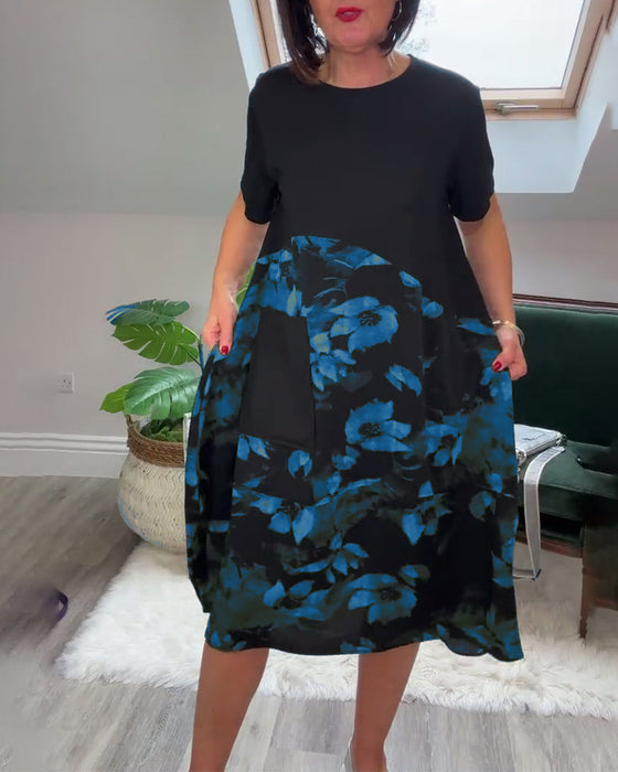 Sukienka z okrągłym dekoltem i kwiatowym nadrukiem oraz patchworkiem