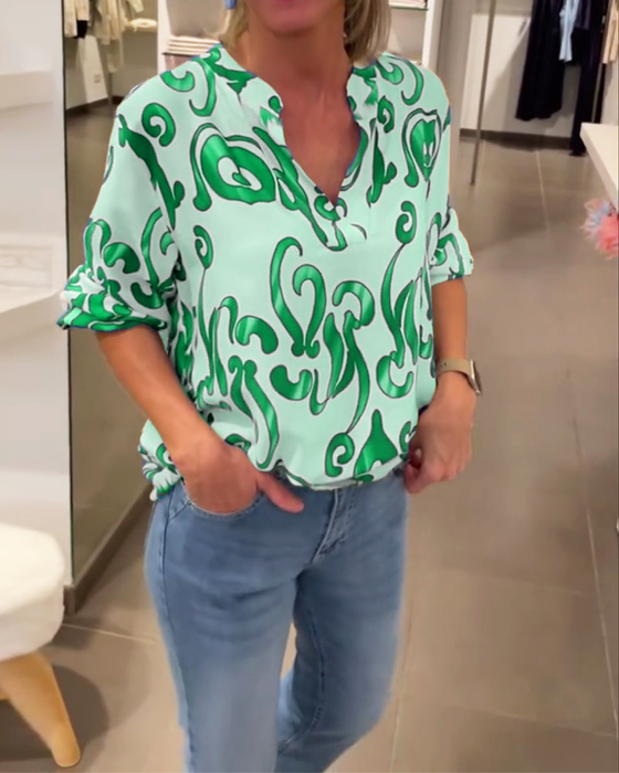 Elegancka bluzka z długim rękawem i dekoltem w kształcie litery V