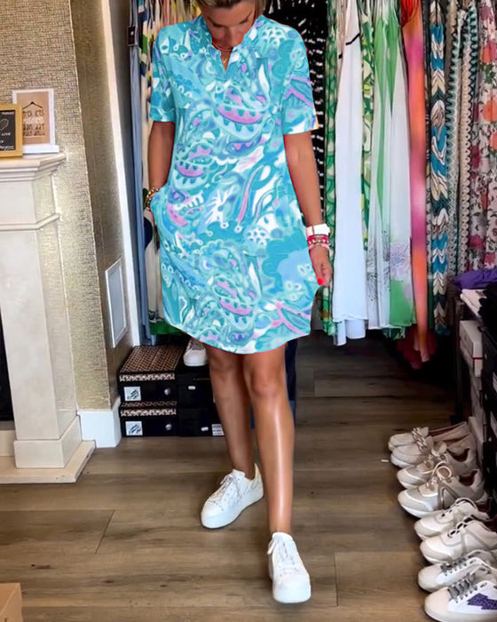 Sukienka z kieszeniami i nadrukiem z krótkim rękawkiem