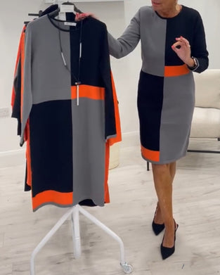 Elegancka sukienka w kolorze dopasowanym do figury z okrągłym dekoltem