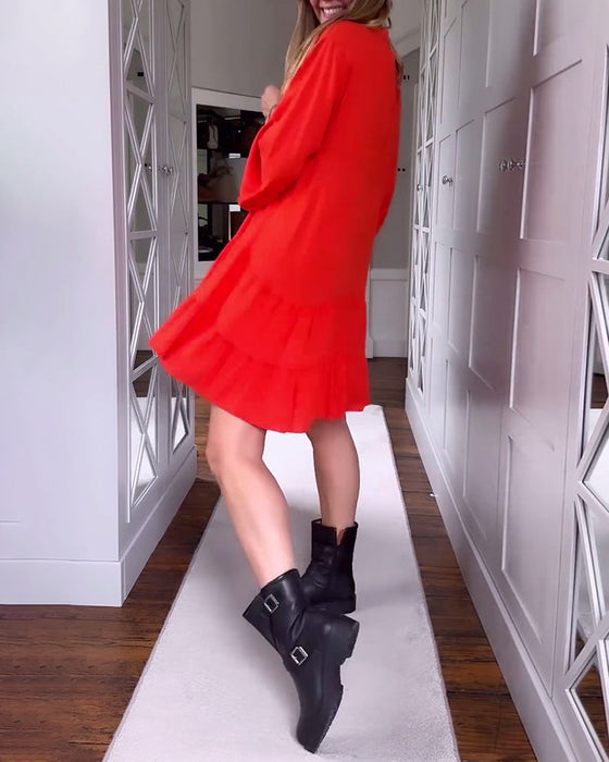 Sukienka w jednolitym kolorze z dekoltem w kształcie litery V rozkloszowana i z długimi rękawami